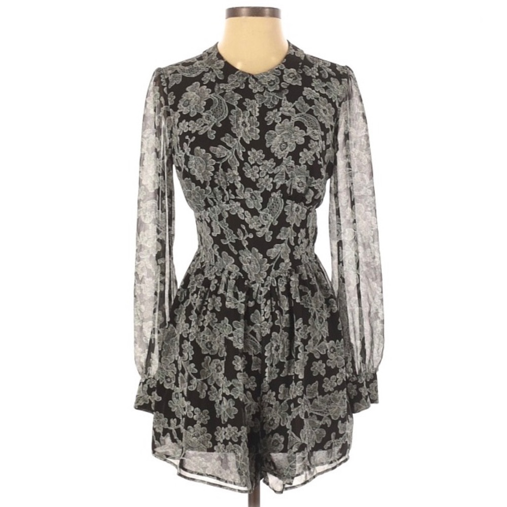 BETHANY MOTA LONG SLEEVE FLORAL ROMPER